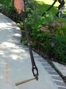 U Canegrabber picking up hammer
